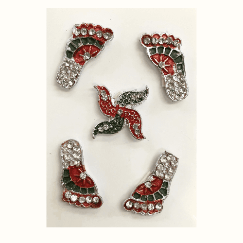 2 sets of paduka or mataji feet in steel exclusive with matching swastika
